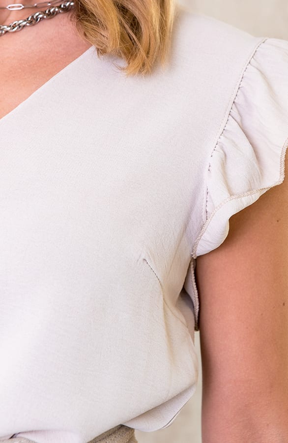 V-hals Ruffle Blouse Beige – shoparchief, foto 2