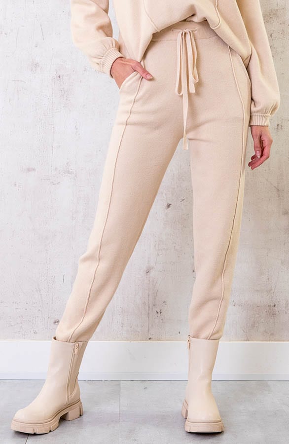 Jogging Broek Met Sierstiksel Beige – shoparchief, foto 1