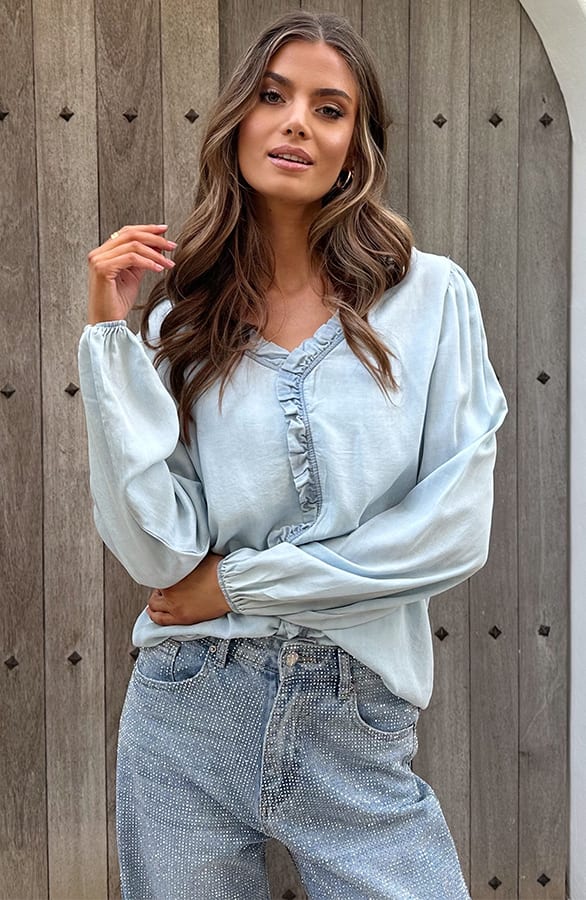 Denim Ruffle Blouse Light Blue – shoparchief, foto 1