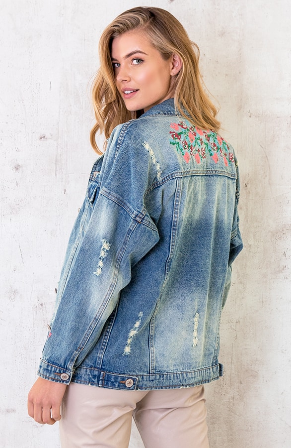 Spijkerjas met borduursels – shoparchief