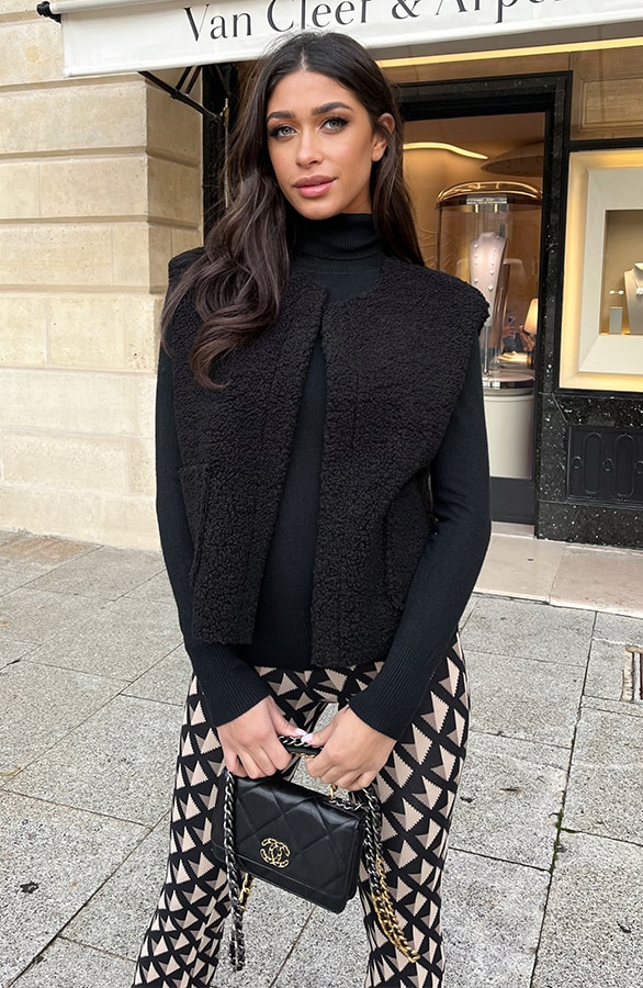 Gilet Pocket Teddy Zwart – shoparchief