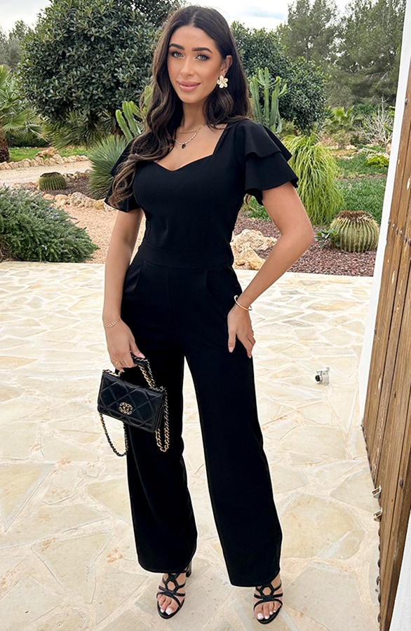 Scuba Jumpsuit Ruffle Mouw Zwart – shoparchief, foto 5